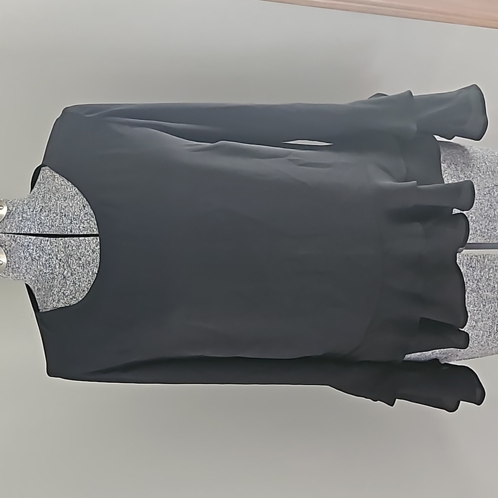 A.n.a black top with ruffle details
